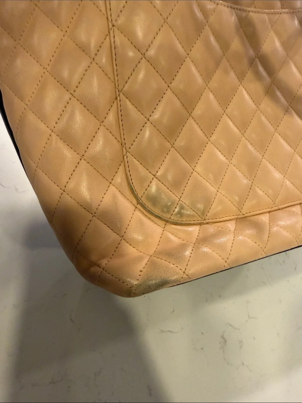 CHANEL Beige Quilted Tote with Black Accents